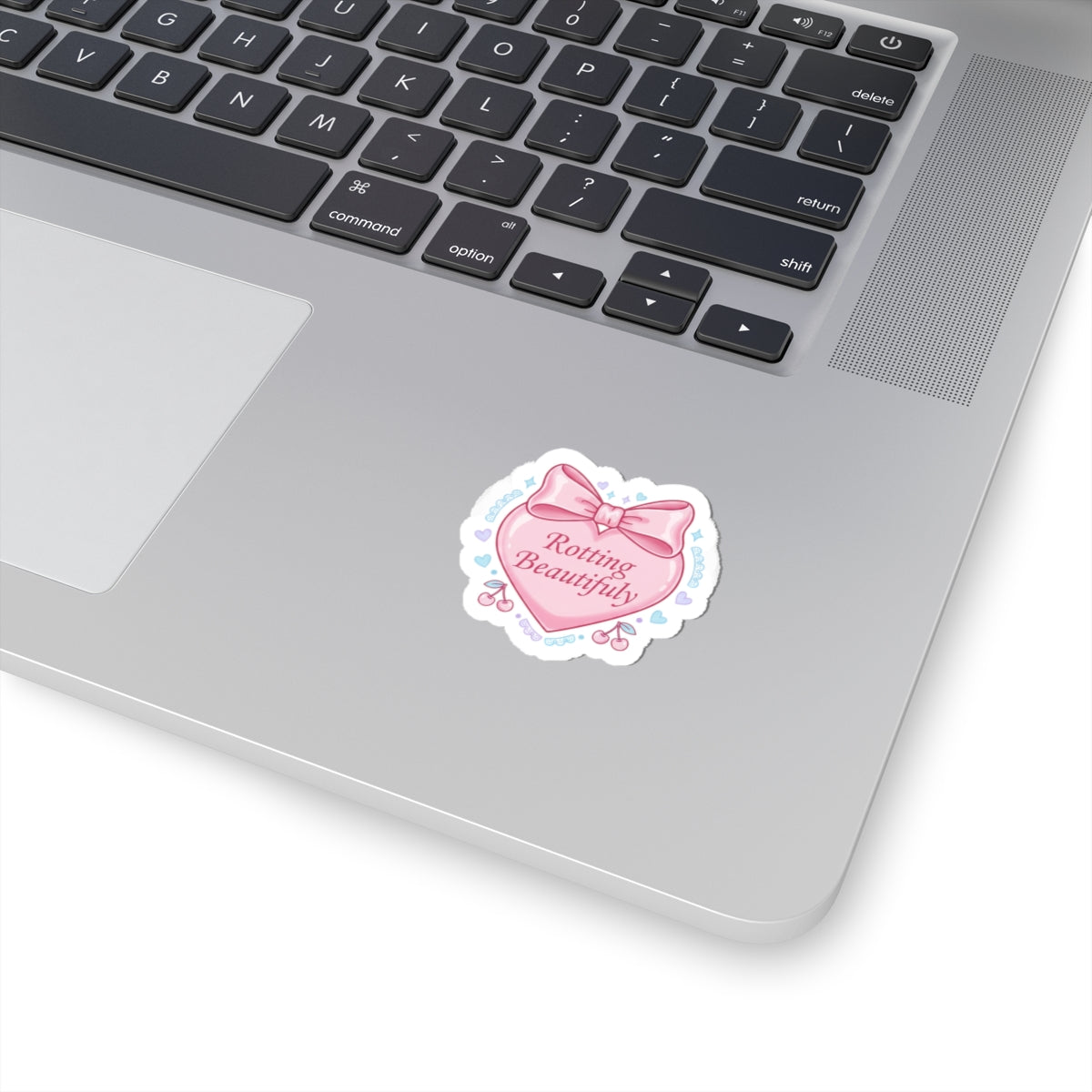 Rotting Beautifully Kiss-Cut Sticker | coquette ribbon, pastel humor